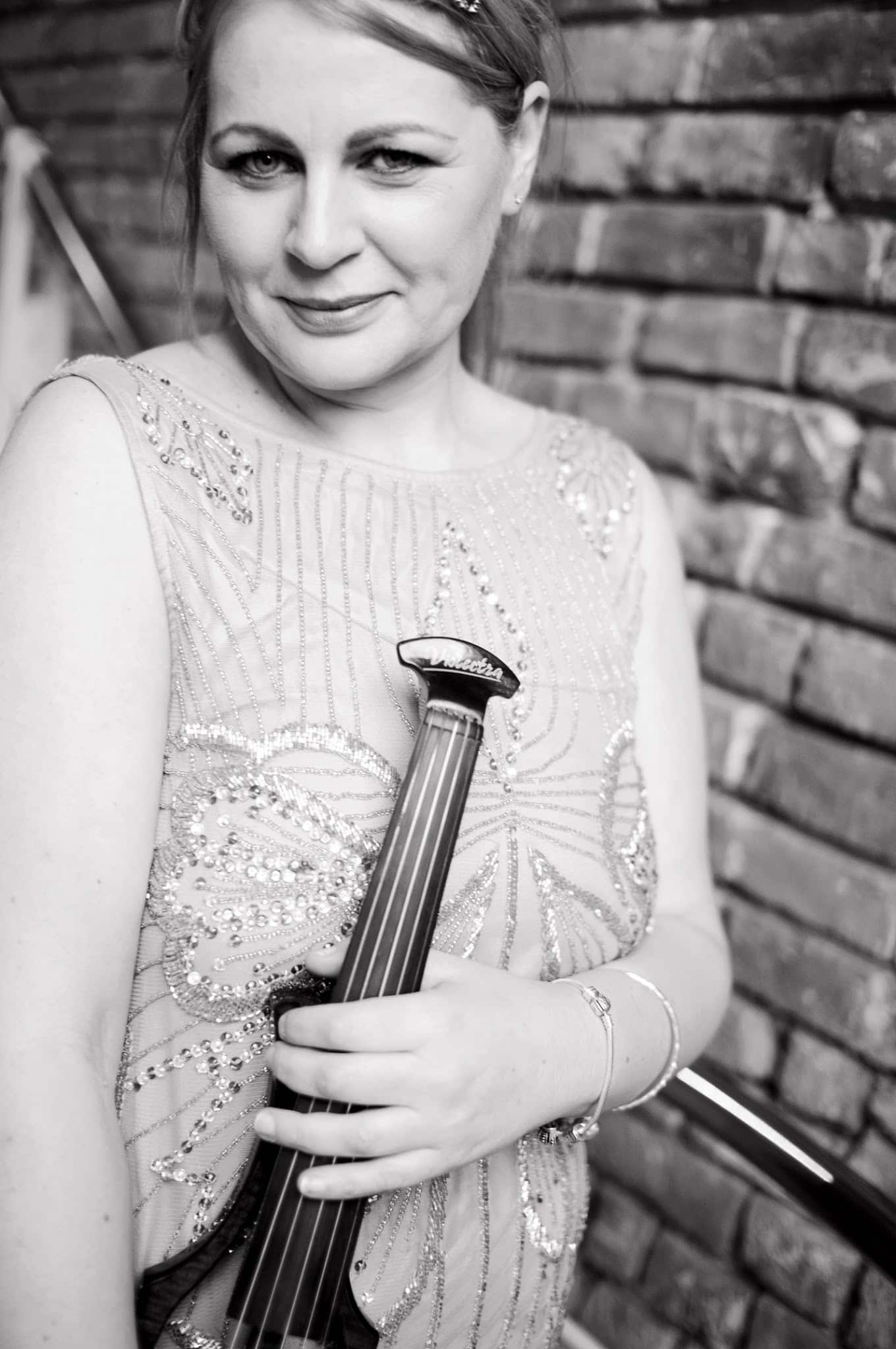 Celeste wedding violinist with her Violectra electric violin