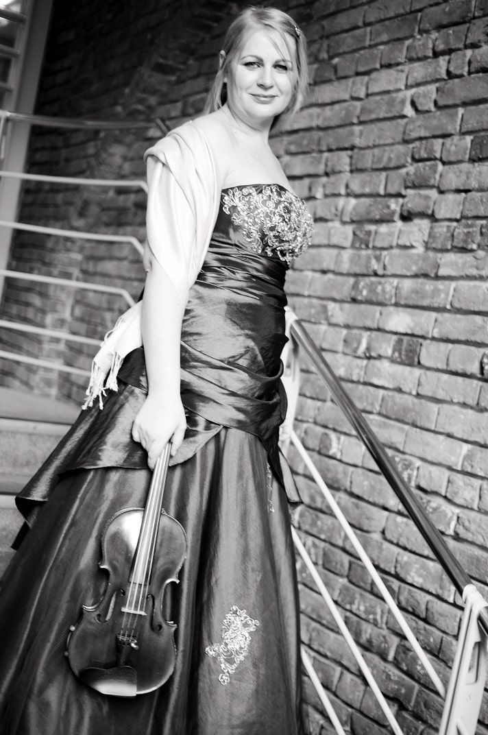 Celeste solo wedding violinist in evening gown