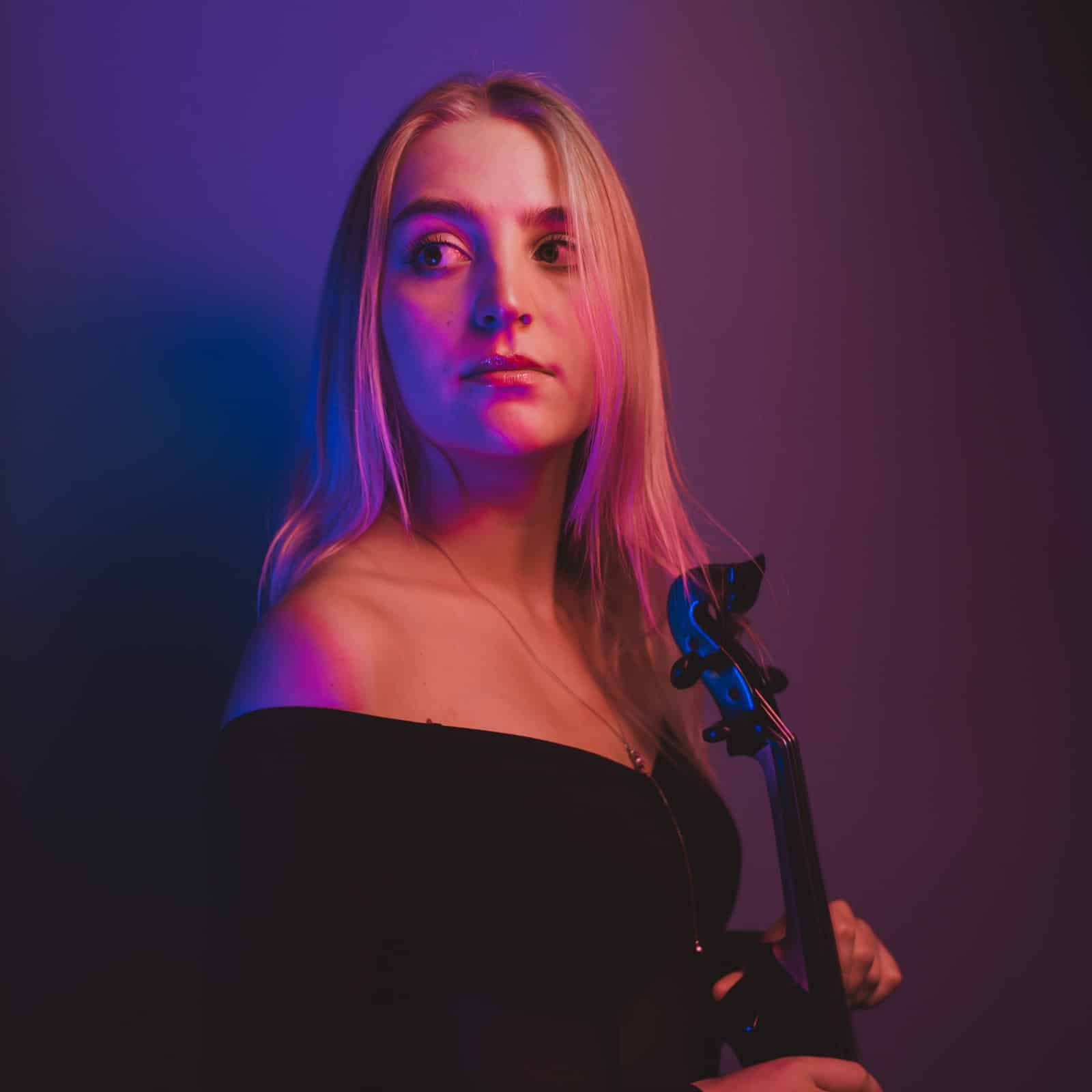 Lyra playing the electric violin